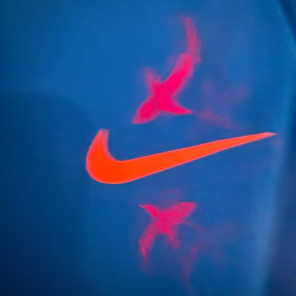 Nike Blue Top with Orange Swoosh